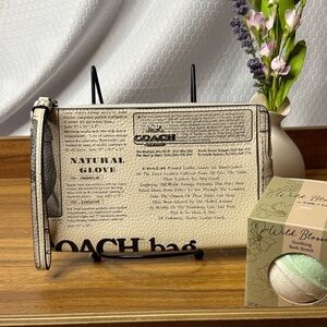 Coach Large Corner Zip Newspaper Print Wristlet and Bath Bomb NWT